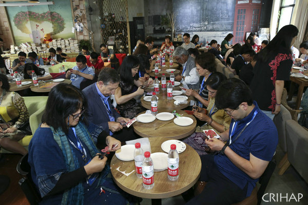 Workshop on capacity building for transmission and sustainable development of traditional craftsmanship held in Shenzhen